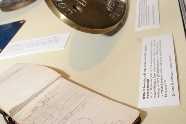 A notebook belonging to Sir Nigel Gresley from 1898 including technical drawings and the workplate of the Wolf of Badenoch at the Mallard exhibition at Doncaster Museum in 2013