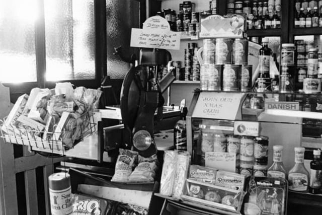 The shop maintained the grocer's traditions, but sadly closed October 1995.