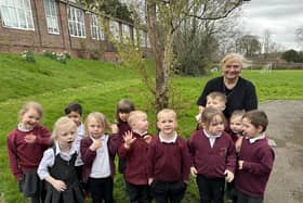 Mrs Hancock with some of the Nursery children she currently looks after