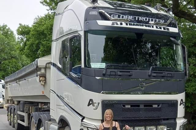 Hayley Hume drives a 14 foot lorry which is almost three times taller than her.