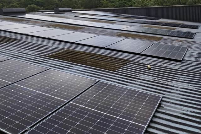 Solar panels being installed on Twiggs' roof