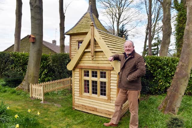 Mark Campbell with his amazing shed/treehouse/fantasy castle.