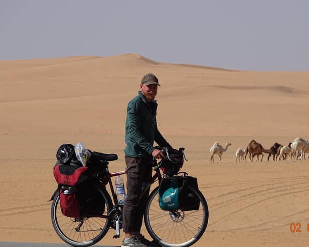 Dan and Alain are cycling 14,000km across the globe.