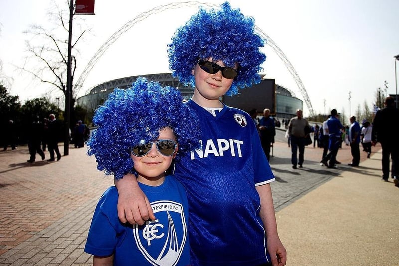 Young Chesterfield fans make their way to the stadium prior to the Johnstone's Paint Trophy Final between Chesterfield and Peterborough United at Wembley Stadium on March 30, 2014.