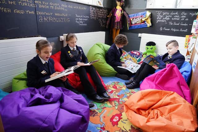 Year 5 pupils in the Curiosity Cabin, an old classroom which was transformed to help inspire pupils in their writing