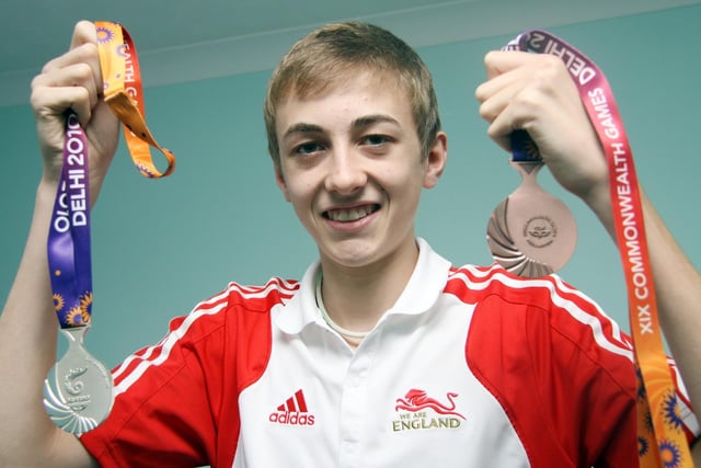 A young Liam Pitchford shows off medals won during a previous Commonwealth Games.
