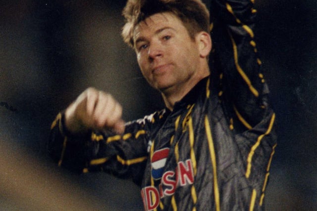 Well hello! Let's be honest, any Wednesday strip worn by Chris Waddle looks good - but this opening effort by Puma in 1993 was on another level. The black and yellow away strip simply oozed class and when you look at it you can't help but think of Waddle and Des Walker in their pomp (we're getting all nostalgic again). The introduction of black kits across the top flight became a more common sight after the then newly-formed Premier League swapped the match officials' traditional black strips for green with black pinstripes.
