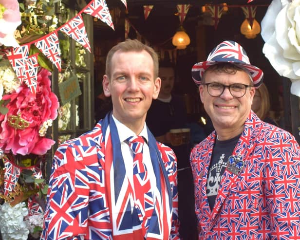 Royal enthusiast James Taylor (left), of Shirebrook, dressed in his Union Jack suit, with friend Dean Caston at the King's Coronation in London last Saturday.