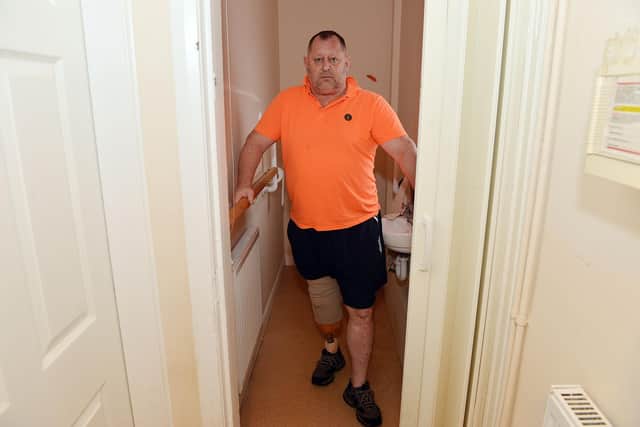 Tony Rawson says the council agreed to convert his downstairs toilet to a wet room but the work has still not been carried out