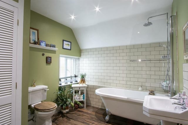 A claw foot bath and Victorian style fittings gives the wow factor to the family bathroom.