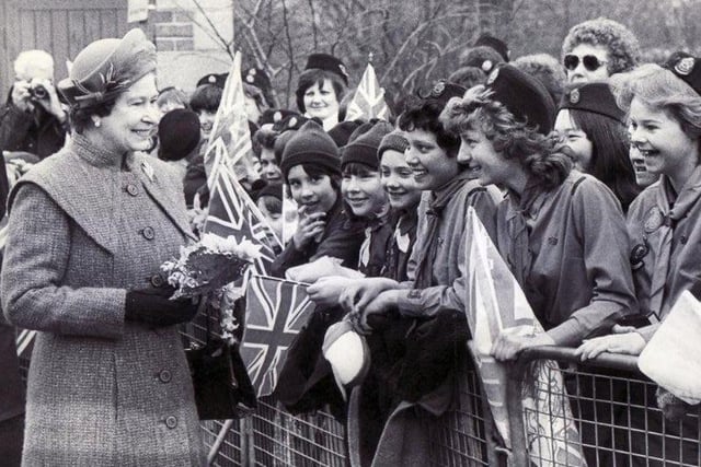 Guides meet the Queen on her visit to Derbyshire in 1981.