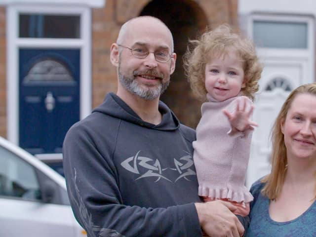 Dan Gore, Cheri Southam and Harper outside their home on Shirland Street, Chesterfield.