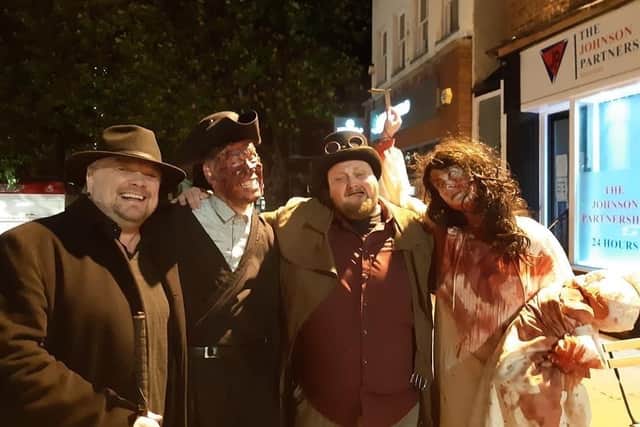 Storyteller Shaun Stevenson, left, tour guide Martin Alvey, second right, with the 'ghosts' of murdered coachman and Mary Churchill.
,