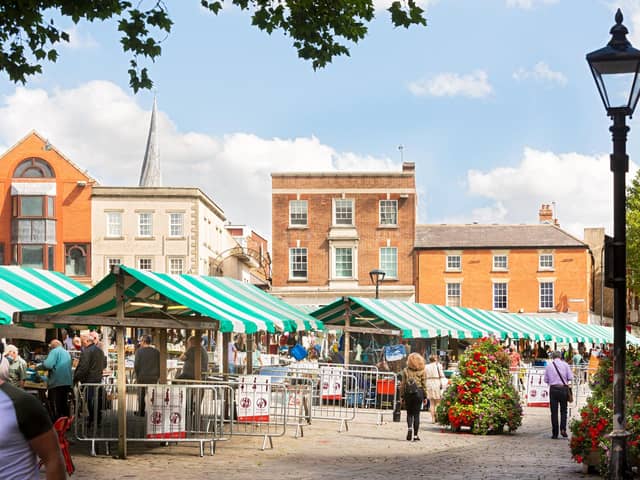 Shoppers browse the open-air market in Chesterfield town centre. Photo by Matthew Jones Photography