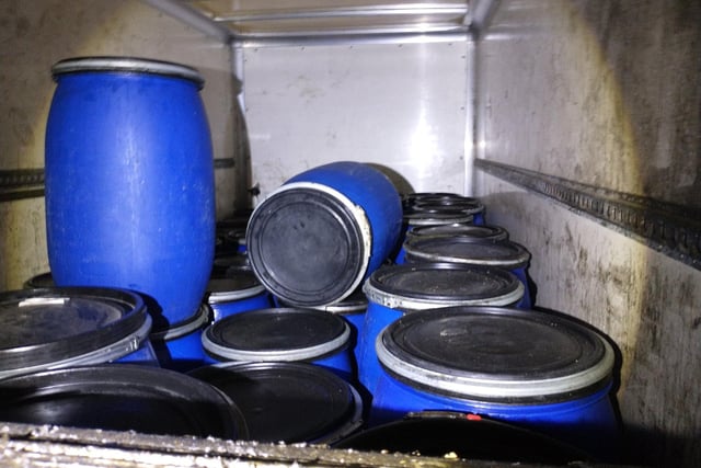 This photo shows the contents of a van pulled over at Tibshelf Services.
Police say the two "slippery customers" inside the van had been reported as stealing used cooking fat from a fast food outlet.