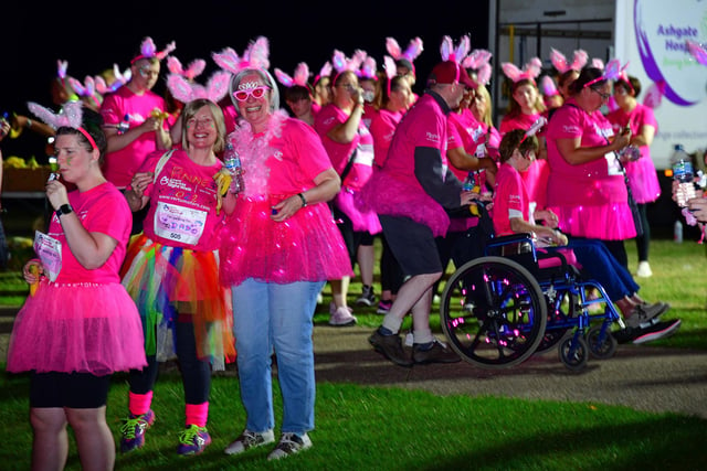 Some walkers added their own accessories to the standard pink T-shirt and flashing bunny ears.