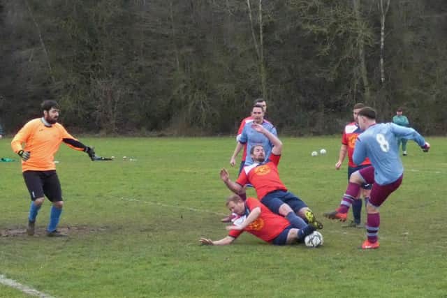 Action from Clay Cross United v Barlow Kingston Rovers, a Chatsworth Cup tie eventually declared void. Photo by Martin Roberts.
