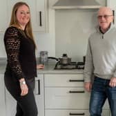 Carla and Tim Goodwin in the kitchen of their new Bellway home at Holbrook Park