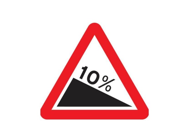 B. Steep hill downwards