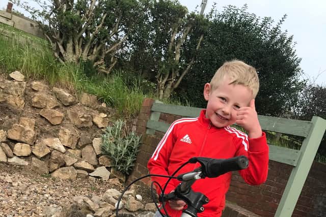 Taylor Marsh, six, is cycling 100 miles to support the NHS during the coronavirus crisis.