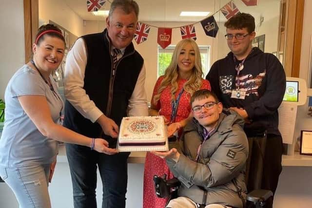 Family-run Luke Evans Bakery based in Alfreton, has been informed by the Derbyshire County Council that it can no longer deliver fresh bread to the schools in the county. Above David Yates, who runs the bakery, giving a free coronation cake to Alfreton Park School last weekend.