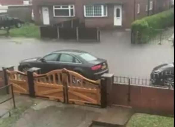 PIcture shows flash flooding in Adwick last night