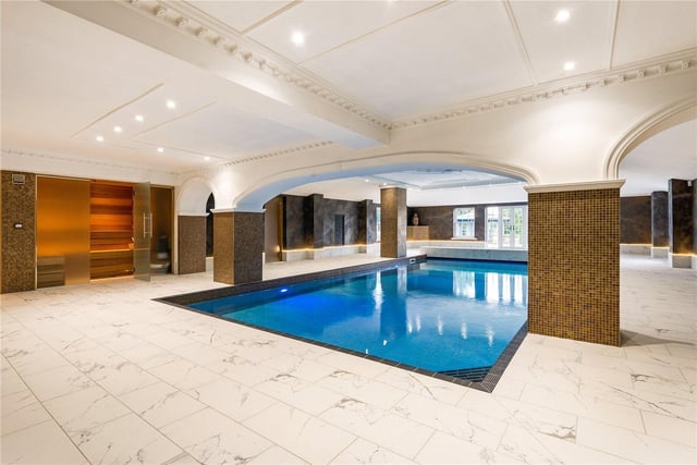 This fabulous indoor swimming pool is set in an 1800sq ft room finished in Venetian plaster with arched walkways.  A shower, sauna and changing room are directly off the pool area.