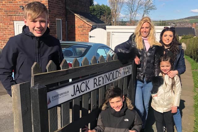 At Jack Reynolds Way are Jack's daughter Jayne Goodwin and great-grandchildren Jack Spencer, Charlie Spencer, Shannon Spencer and Brooke Spencer.