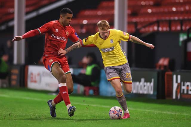 Nathan Newall of Alfreton Town in action with David Okagbue of Walsall. (Photo by Marc Atkins/Getty Images)