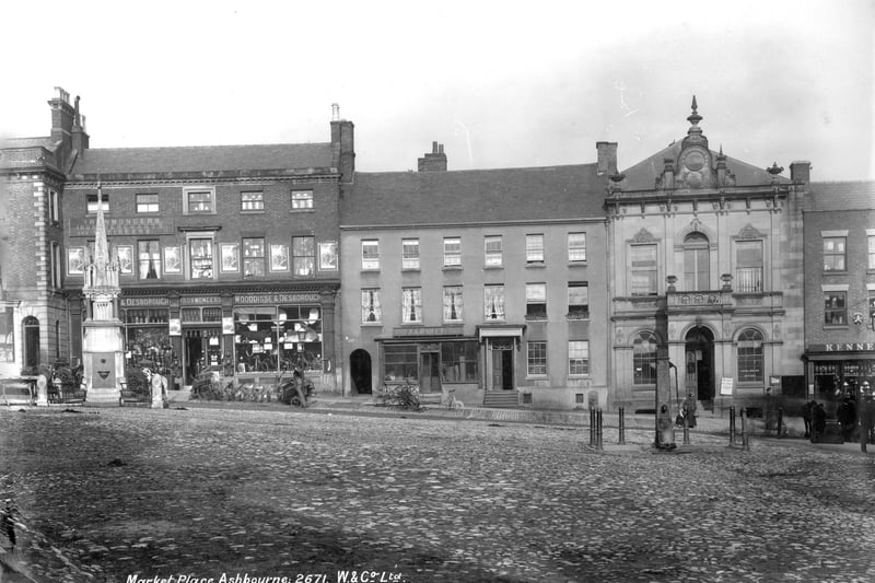 1890-1910: Market Place in Ashbourne looking towards an ironmongers and a public water pump. (Photo by English Heritage/Heritage Images/Getty Images)