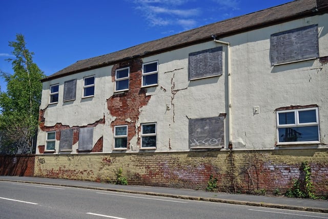 There are a number of empty and run-down buildings along Brimington Road leading to the station