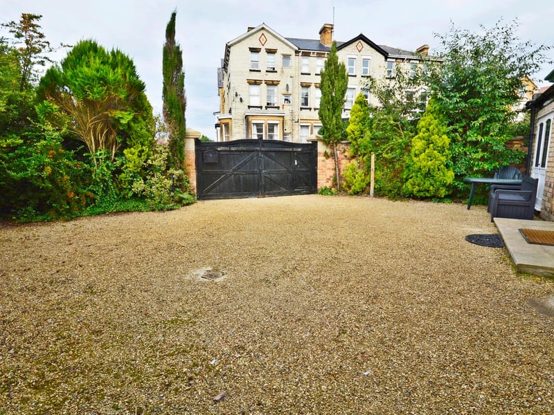 The property benefits from private gated parking and forecourt.