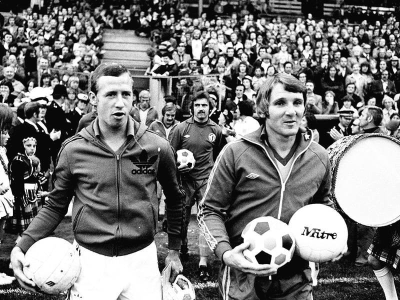 Sandy Pate with John McGovern as Pate runs out for his Testimonial match at Field Mill.