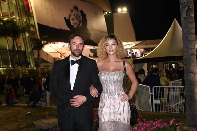 Richard walking the red carpet at Cannes with Loreal model Camryn Herold. Pic submitted