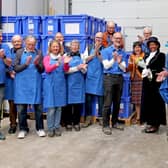 Theresa Peltier, outgoing High Sheriff of Derbyshire, with Aquabox volunteers