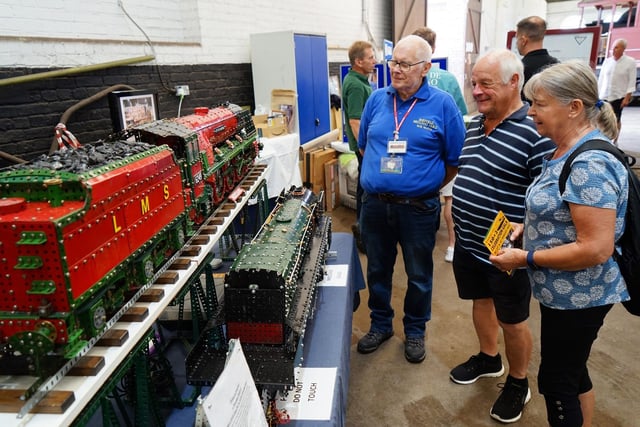 Visitors admire trains by Sheffield Meccano guild member Bob Seaton.