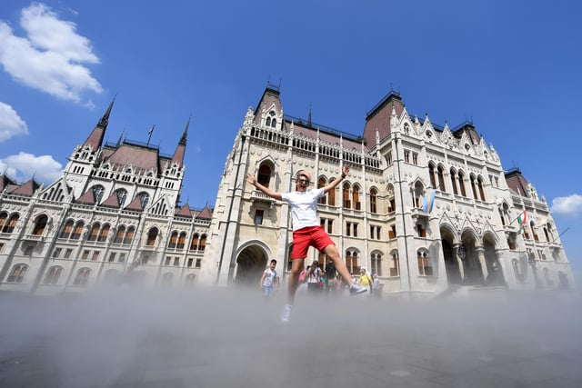 Here's someone enjoying water sprays in front of the parliament building in Budapest. Flights to Budapest and Debrecen take off from Doncaster Sheffield Airport.
