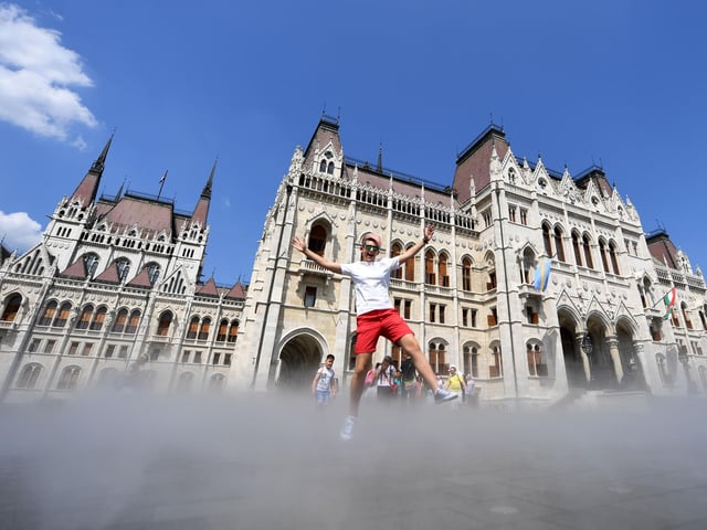 Here's someone enjoying water sprays in front of the parliament building in Budapest. Flights to Budapest and Debrecen take off from Doncaster Sheffield Airport.