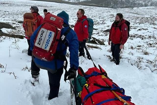 Edale Mountain Resuce team carrying a patient on a stretcher. Pic submitted