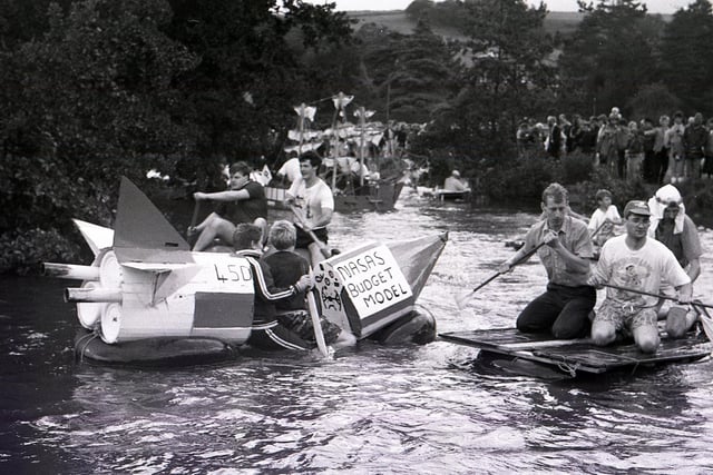 Bakewell Carnival  raft race contestants paddle for all they're worth back in 1990