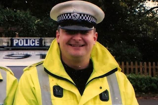 PC Andy Green was praised by the biker, who said his actions saved his life