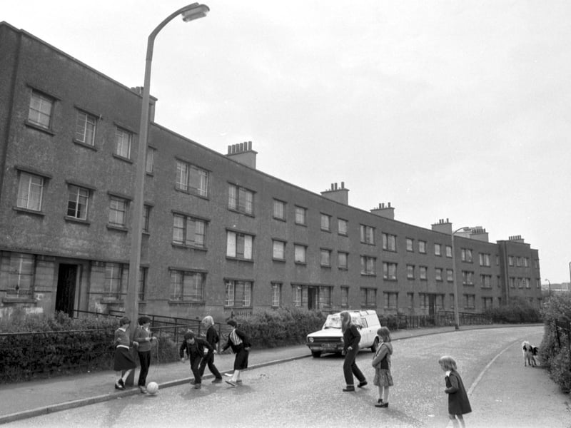Children playing in the street at West Pilton Circus in Edinburgh, June 1981.