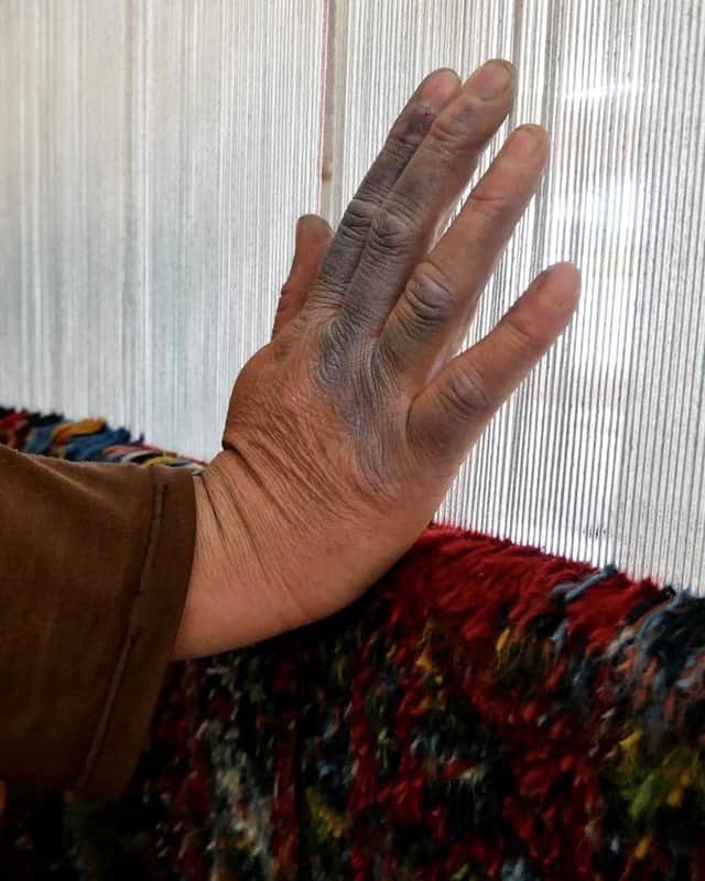 Armaghan Fatemi's Invisible Hands shows how professional weaving takes its toll on women.