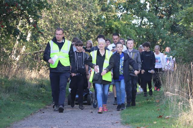 A group of Chesterfield teenagers honoured Logan Folger and raised money for Sheffield Children's Hospital through a sponsored walk.