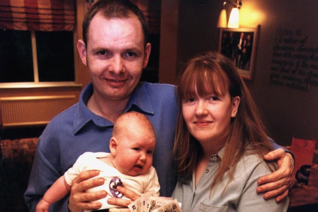 Sean and Nadine McArthur with Baby Jessica and their donation to the Chesterfield Hospital Special Baby Care Unit in 2001
