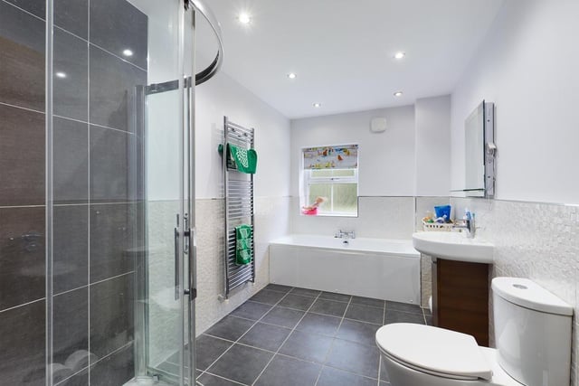 A bath and shower cubicle are included in the family bathroom on the first floor.