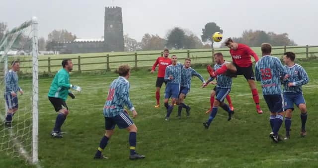 Britannia (in red) put pressure on the Hepthorne Lane goal in their 7-0 win. Photo by Martin Roberts.