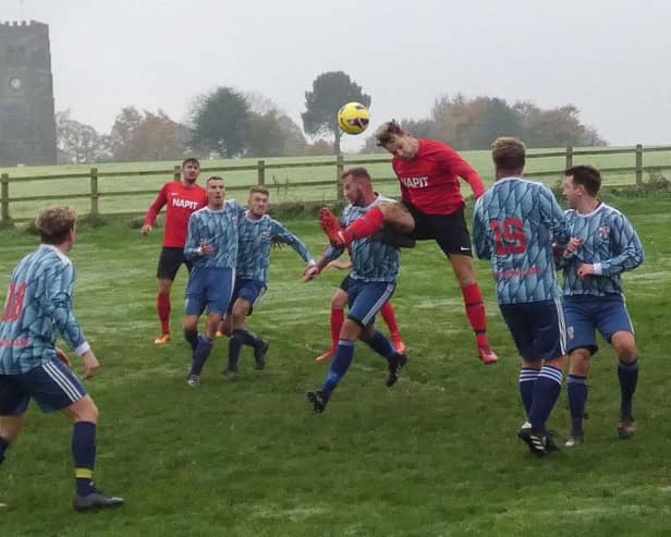 Britannia (in red) put pressure on the Hepthorne Lane goal in their 7-0 win. Photo by Martin Roberts.
