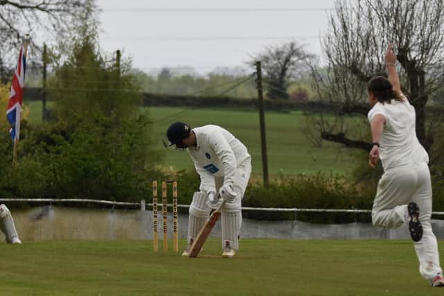 James La Brooy bowls Ash Caunt to claim the first of his six wickets. Photo: Carl Jarvis