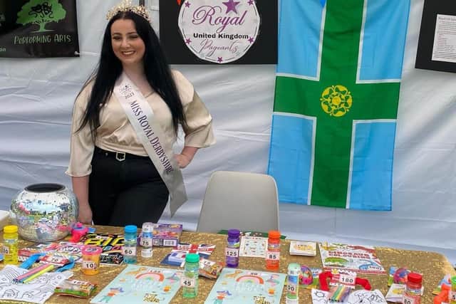 Charlotte with her stall at Morton's Coronation event.